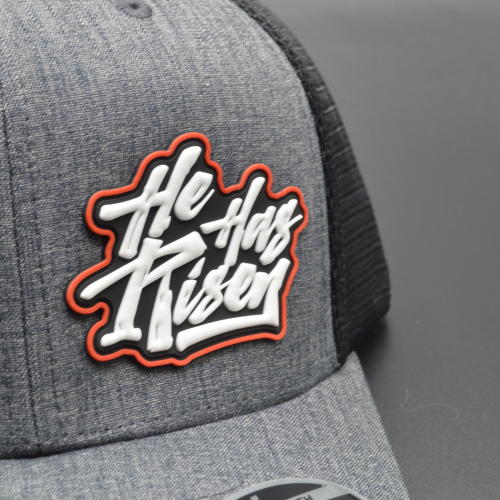 'HE HAS RISEN' FLEXFIT 110® MESH CAP - 2-TONE
