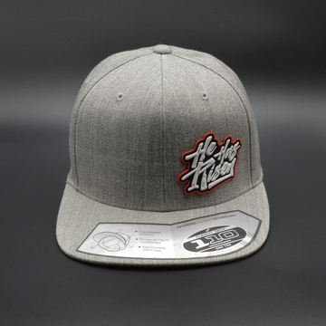 'HE HAS RISEN' FLEXFIT 110® PREMIUM SNAPBACK CAP