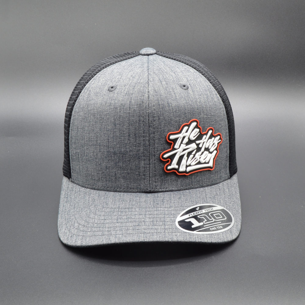 'HE HAS RISEN' FLEXFIT 110® MESH CAP - 2-TONE