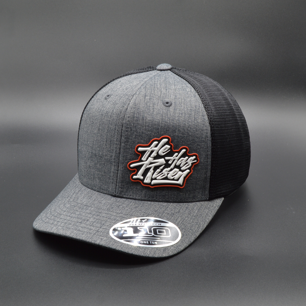 'HE HAS RISEN' FLEXFIT 110® MESH CAP - 2-TONE