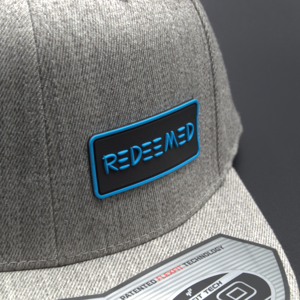 'REDEEMED' FLEXFIT 110® PREMIUM SNAPBACK CAP